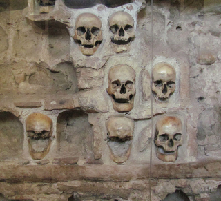 Illustration for article titled These Buildings Are Made with Skulls and Bones